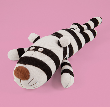 Tiger Soft Toy - black and white sock toy in the shape of a sleeping tiger
